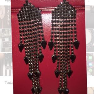 Black Rhine stone dramatic drop earrings.